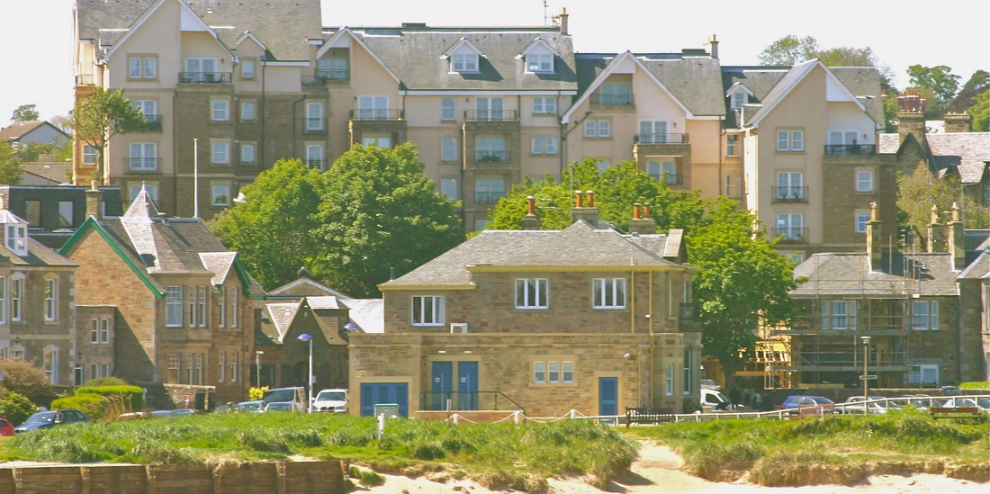 view to Royal Apartments from the beach